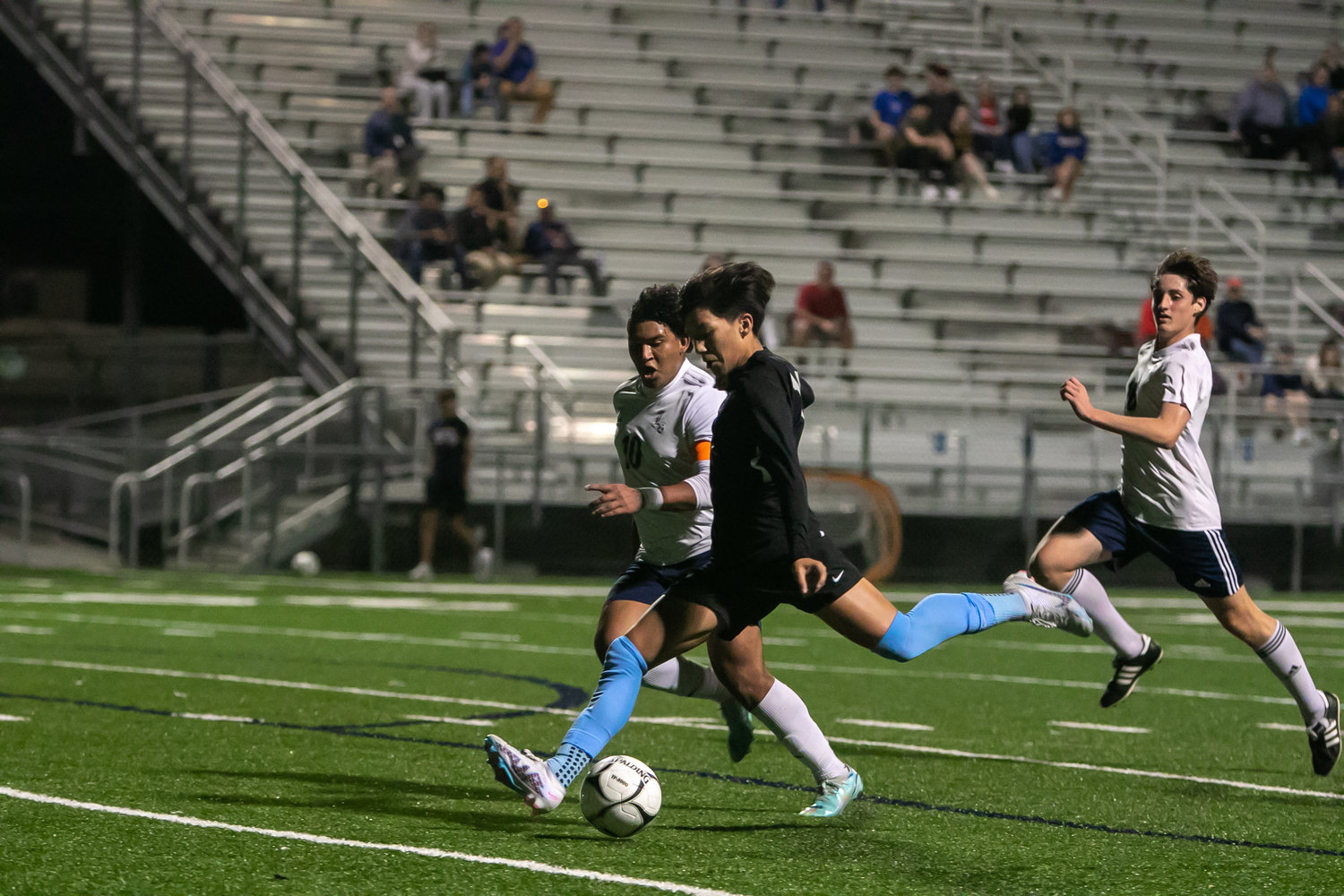 Cesar Garcia scores on a left footed shot during Tuesday's match between Paetow and Lamar at the Spring Woods football field.
