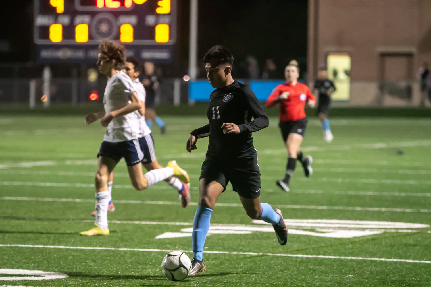 Jose Dominguez dribbles up the field during Tuesday's match between Paetow and Lamar at the Spring Woods football field.
