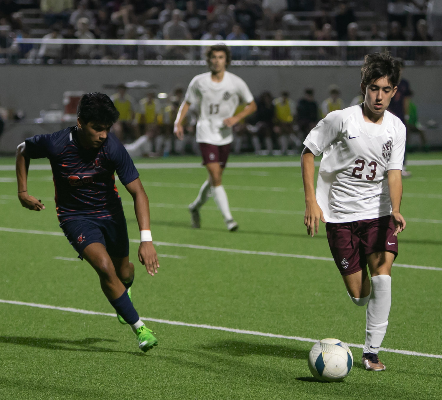 Noah Bosso dribbles a ball during Friday's Class 6A Regional Quarterfinal game between Seven Lakes and Cinco Ranch at Legacy Stadium.