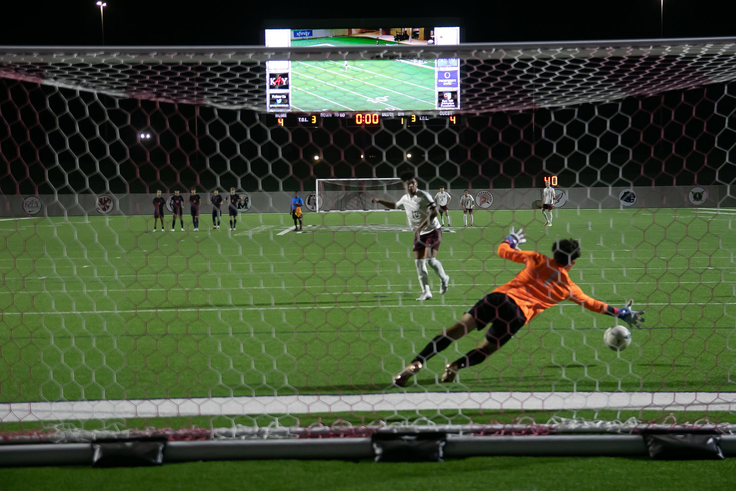 Ben Aviles Vera dives to try and save a penalty during Friday's Class 6A Regional Quarterfinal game between Seven Lakes and Cinco Ranch at Legacy Stadium.