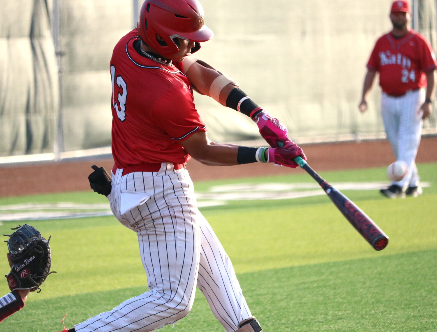 Nayden Ramirez hits during Friday's area round game between Katy and Cy-Fair at Langham Creek.