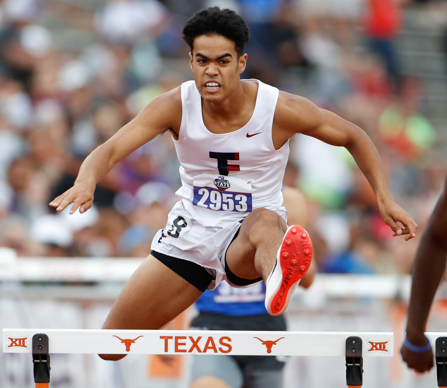 Jayden Keys of Tompkins High School (2953) competes in the the Class 6A boys 300-meter hurdles, winning the bronze medal, during the UIL State Track and Field Meet on Saturday, May 13, 2023 in Austin.