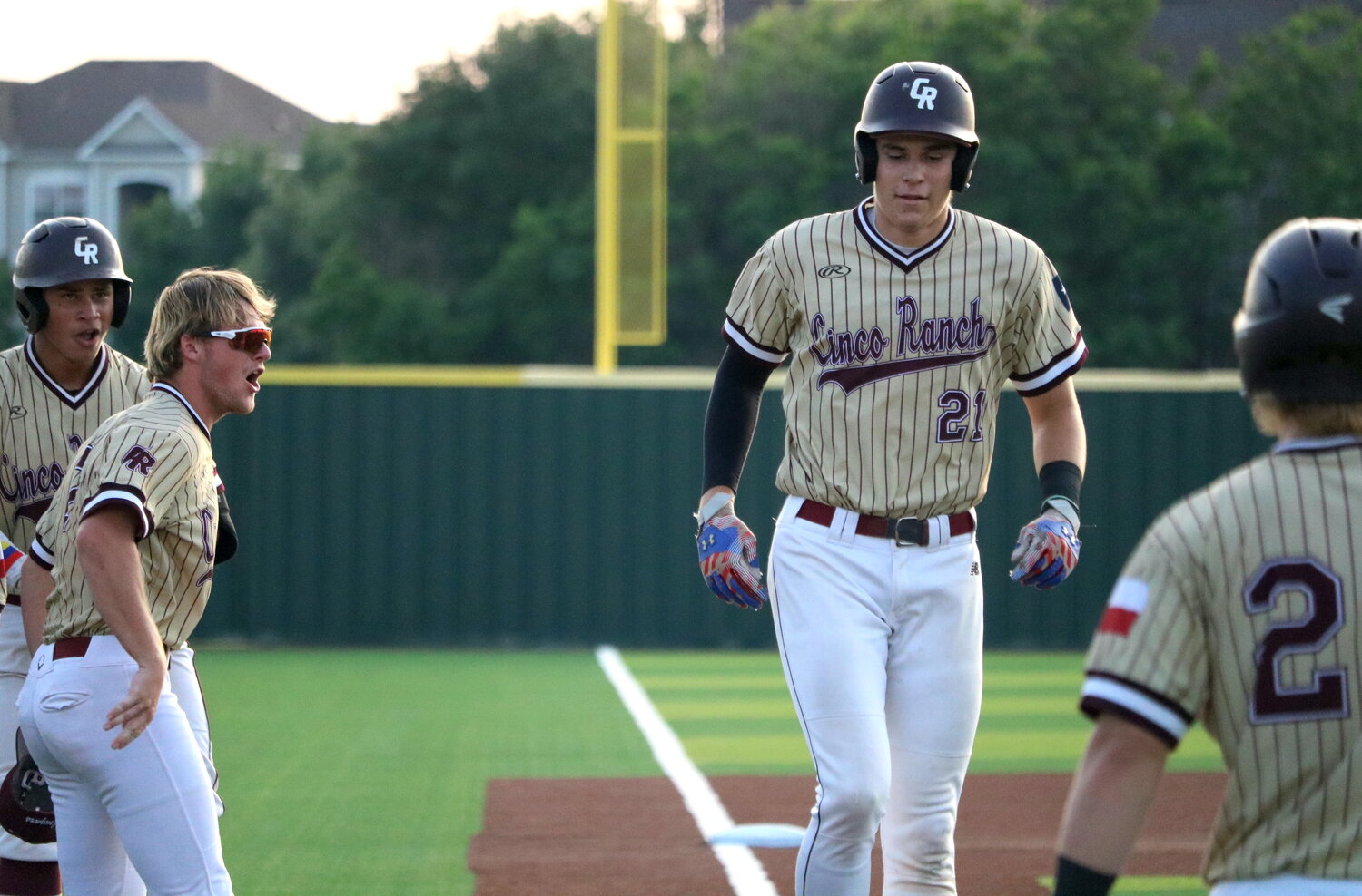 Charlie Atkinson steps towards home plate after a home run during Friday's Regional Quarterfinal between Cinco Ranch and Ridge Point at Langham Creek.