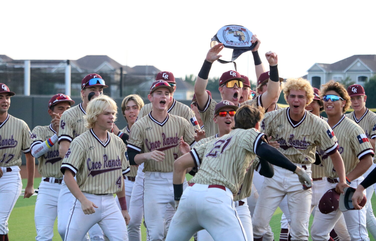 Cinco Ranch players celebrate after a Charlie Atkinson home run during Friday's Regional Quarterfinal between Cinco Ranch and Ridge Point at Langham Creek.