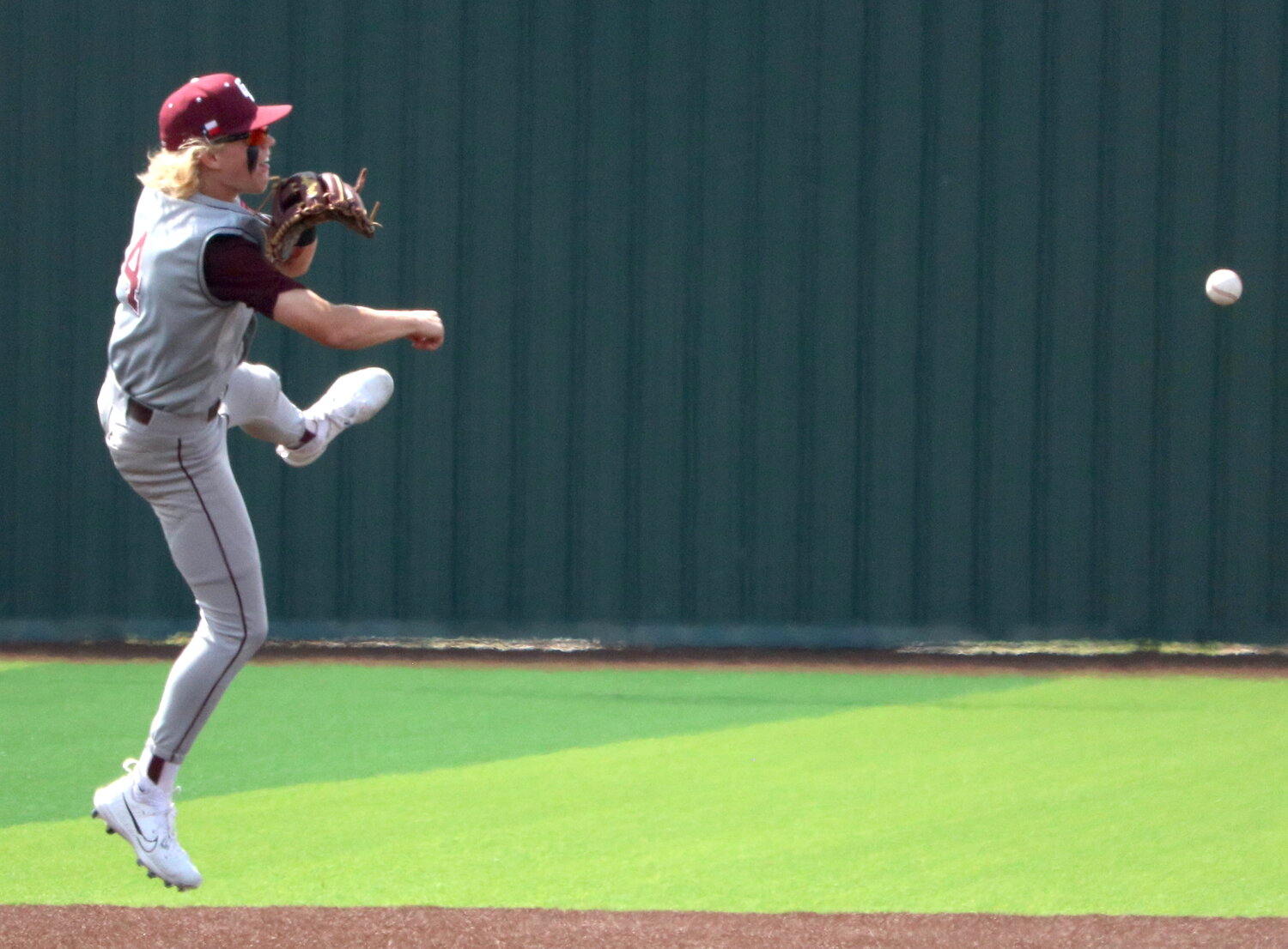 Brock DeYoung throws to second base during Saturday's Regional Quarterfinal between Cinco Ranch and Ridge Point.