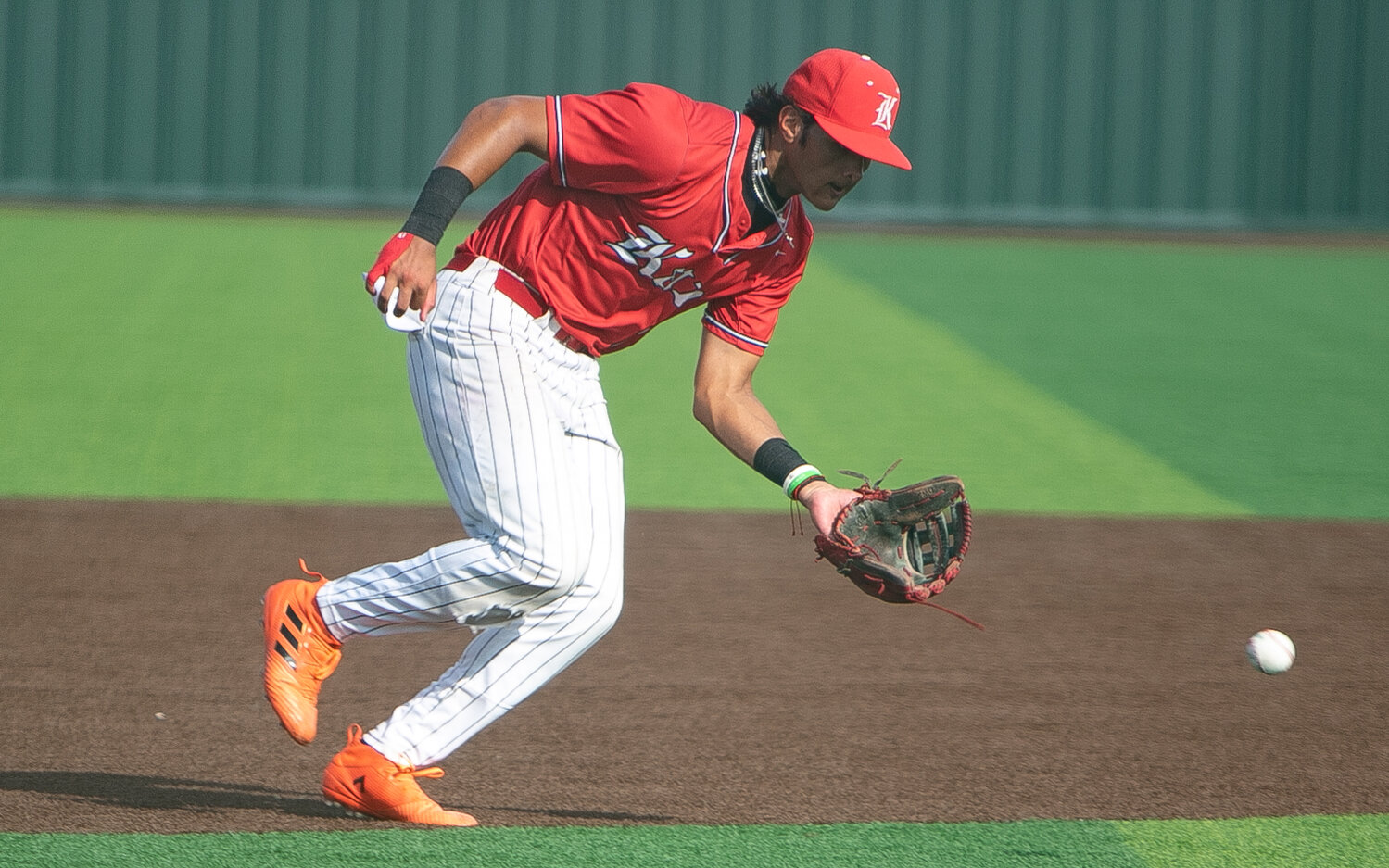 Nayden Ramirez makes a play in the infield during Saturday's Regional Quarterfinal between Katy and Tompkins at Cy-Springs.