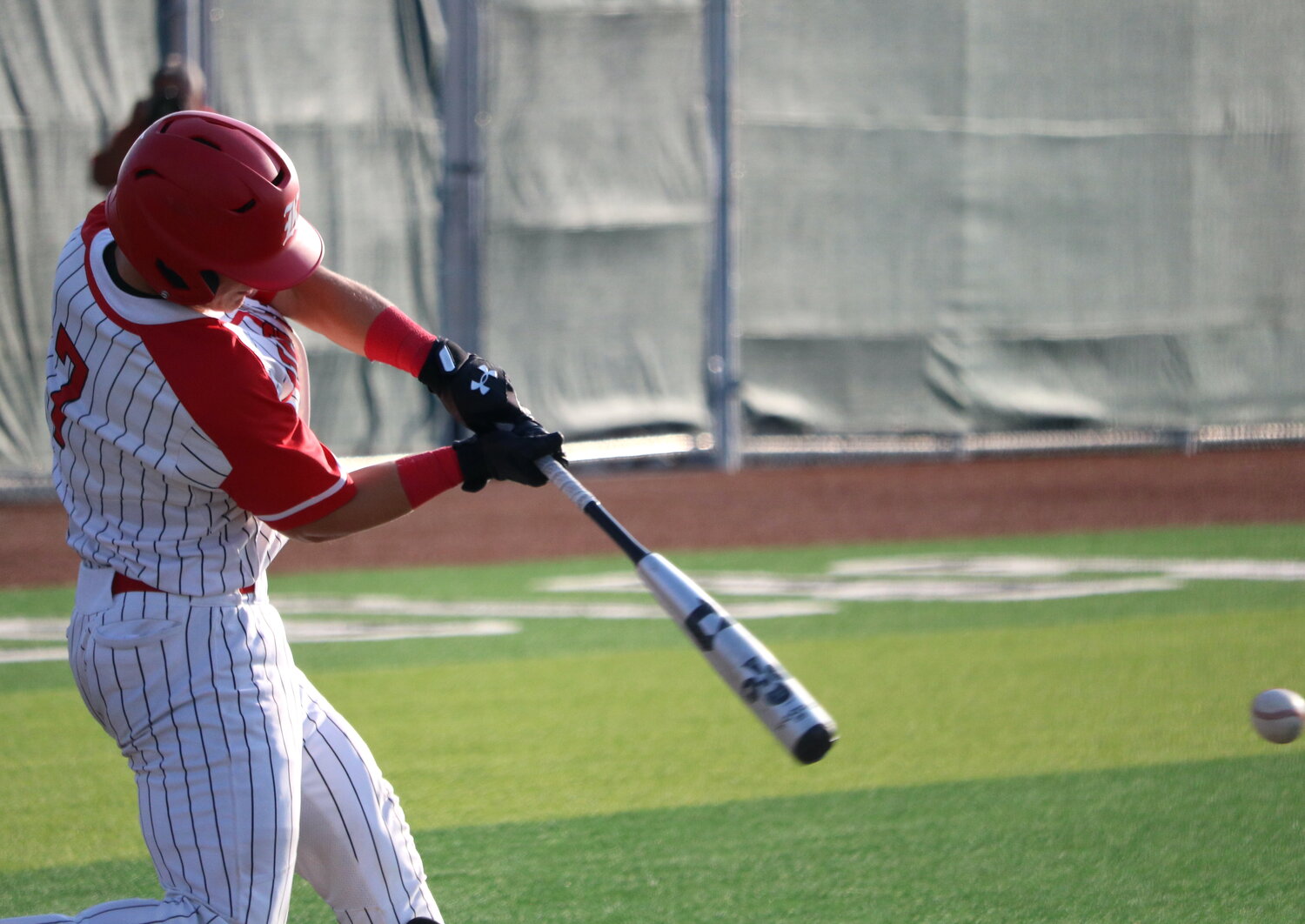 Brady Englett hits during Thursday's Regional Semifinal between Katy and Clear Springs at Langham Creek.