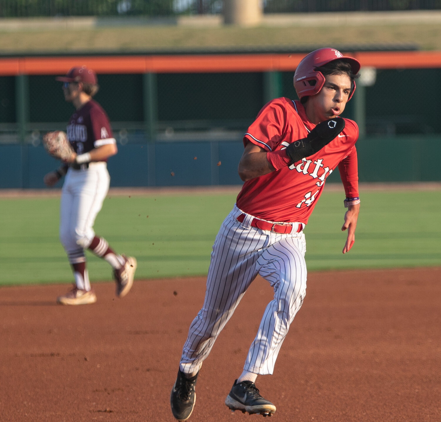 AJ Atkinson rounds third base during Friday's Regional Final between Katy and Pearland at Constellation Field in Sugar Land.