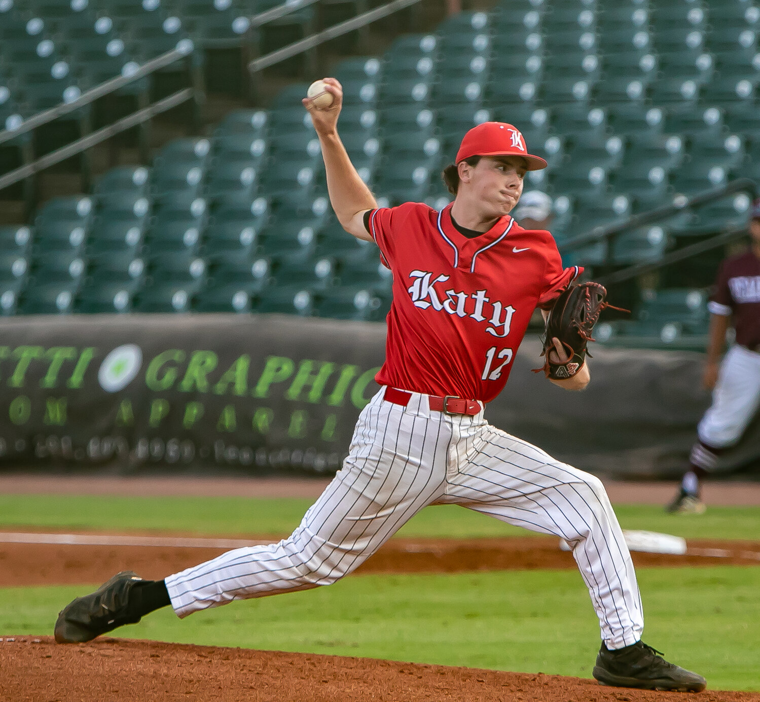 Lucas Moore pitches during Friday's Regional Final between Katy and Pearland at Constellation Field in Sugar Land.