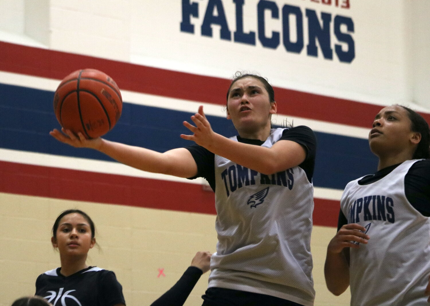 Rihanna DeLeon shoots a layup during Thursday's game between Tompkins and Laredo United South defenders at the Tompkins gym.