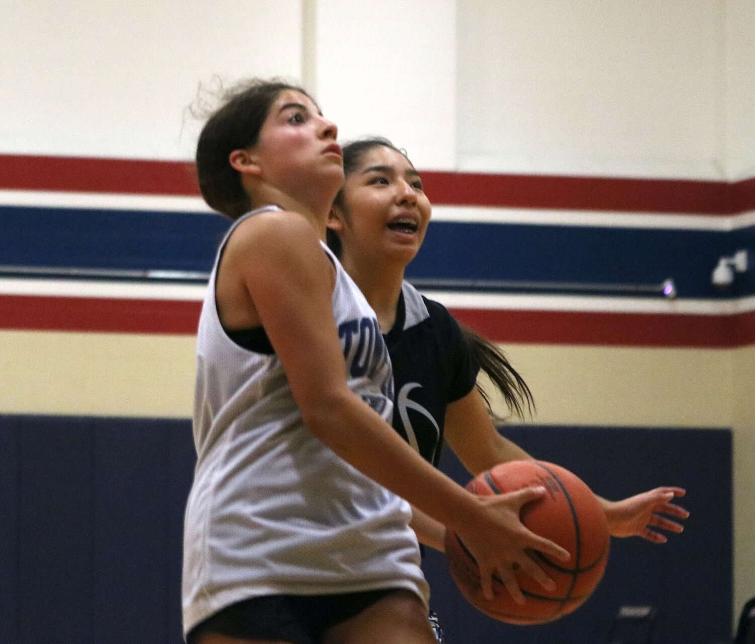 Sascha Cougran drives to the basket during Thursday's game between Tompkins and Laredo United South defenders at the Tompkins gym.