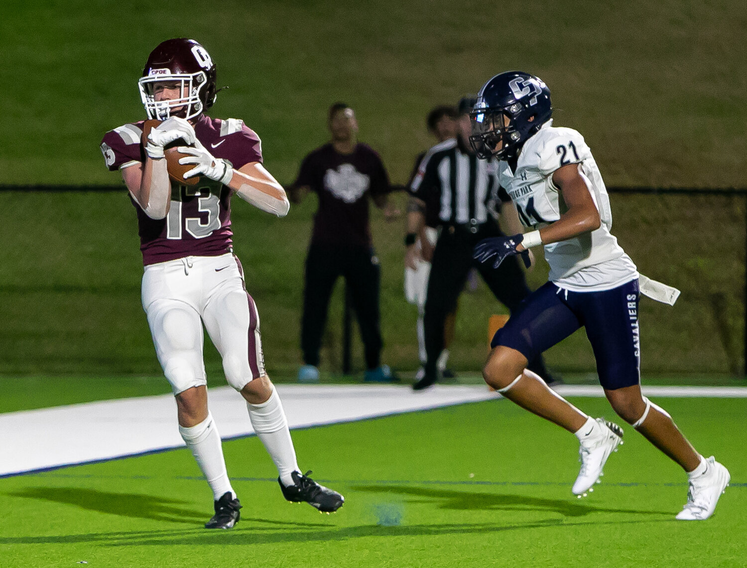 Drew Tureau brings in a 2-point conversion during Friday's game between Cinco Ranch and College Park at Rhodes Stadium.
