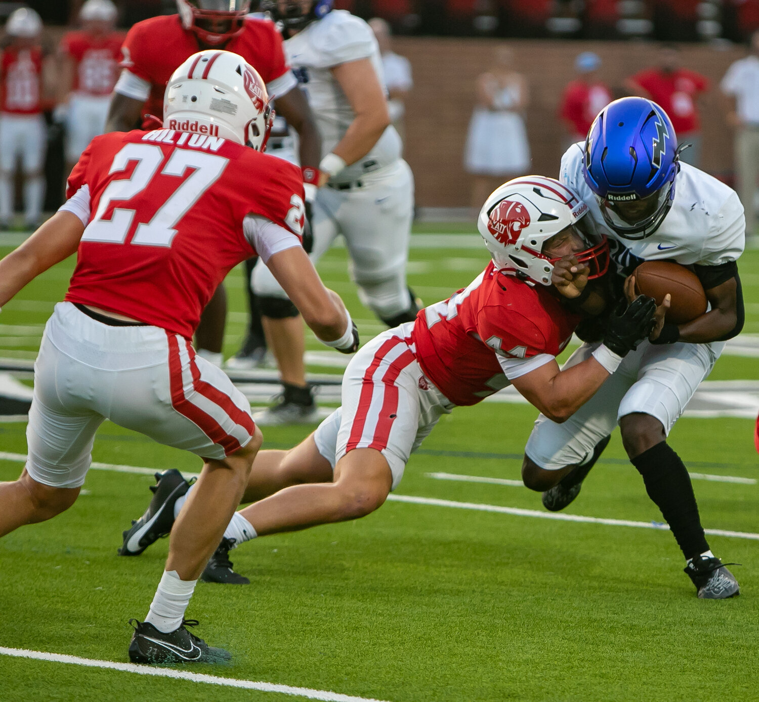 Connor Johnsey takes down a Clear Springs player during Saturday's game between Katy and Clear Springs at Rhodes Stadium.