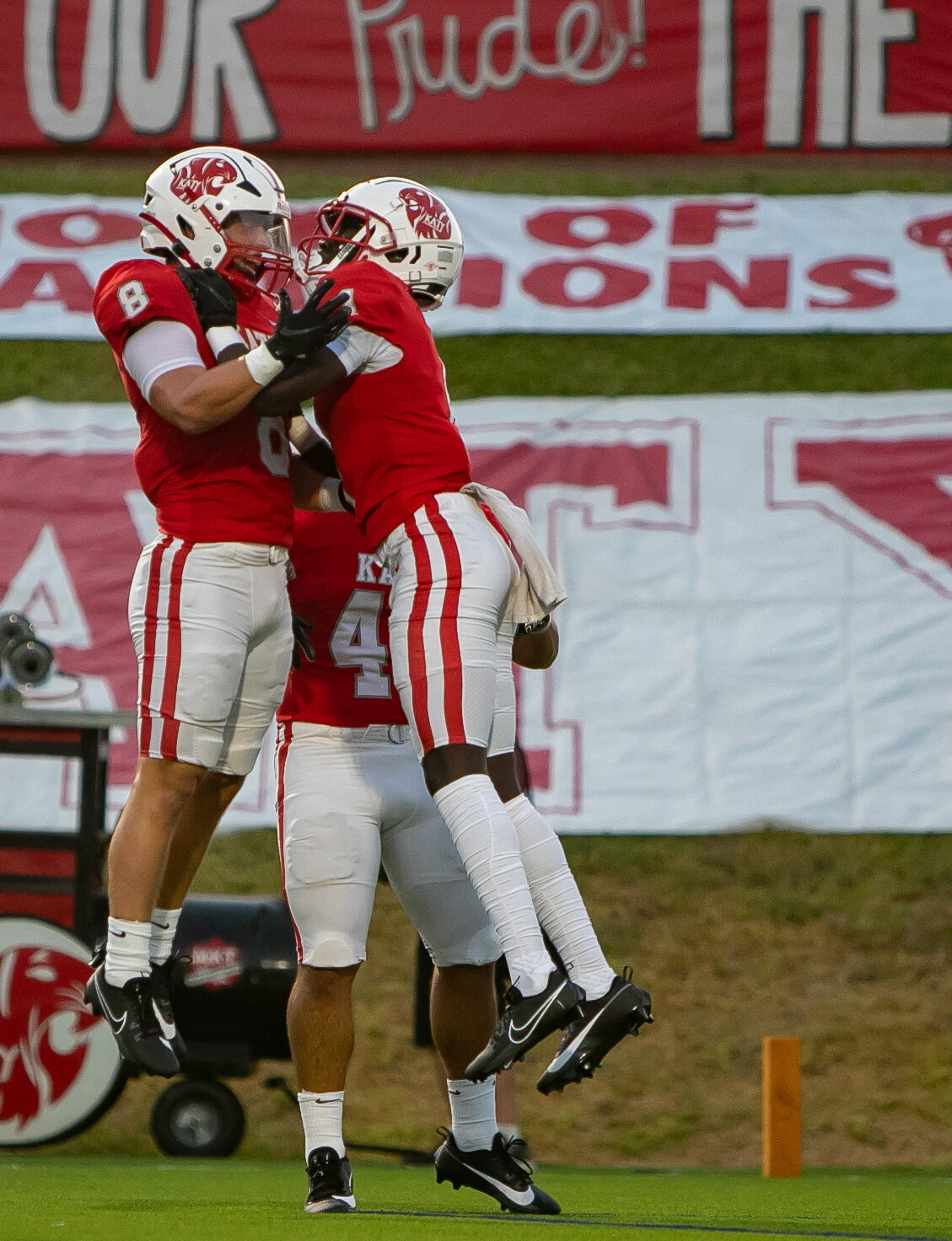 Chase Johnsey and Israel Olotu-Judah celebrate after a touchdown during Saturday's game between Katy and Clear Springs at Rhodes Stadium.