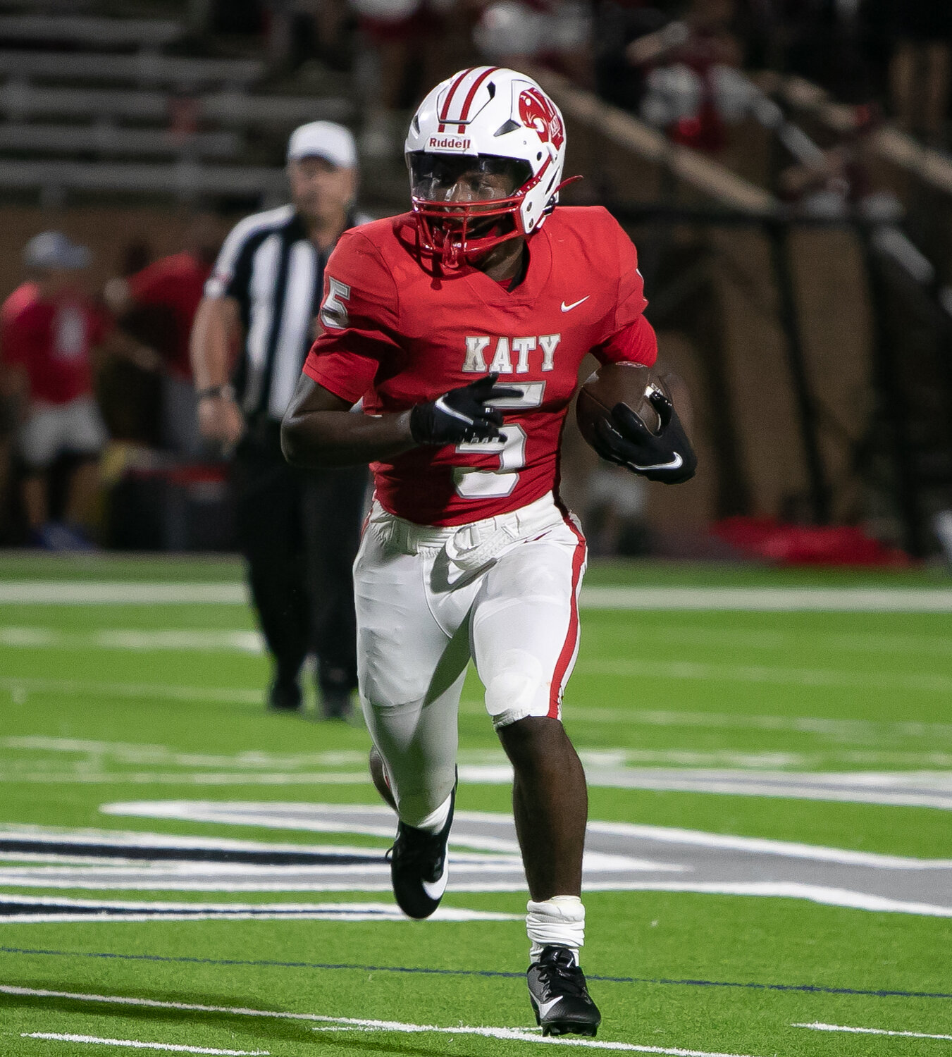 Romel Jordan runs downfield during a game between Katy and Clear Springs at Rhodes Stadium.