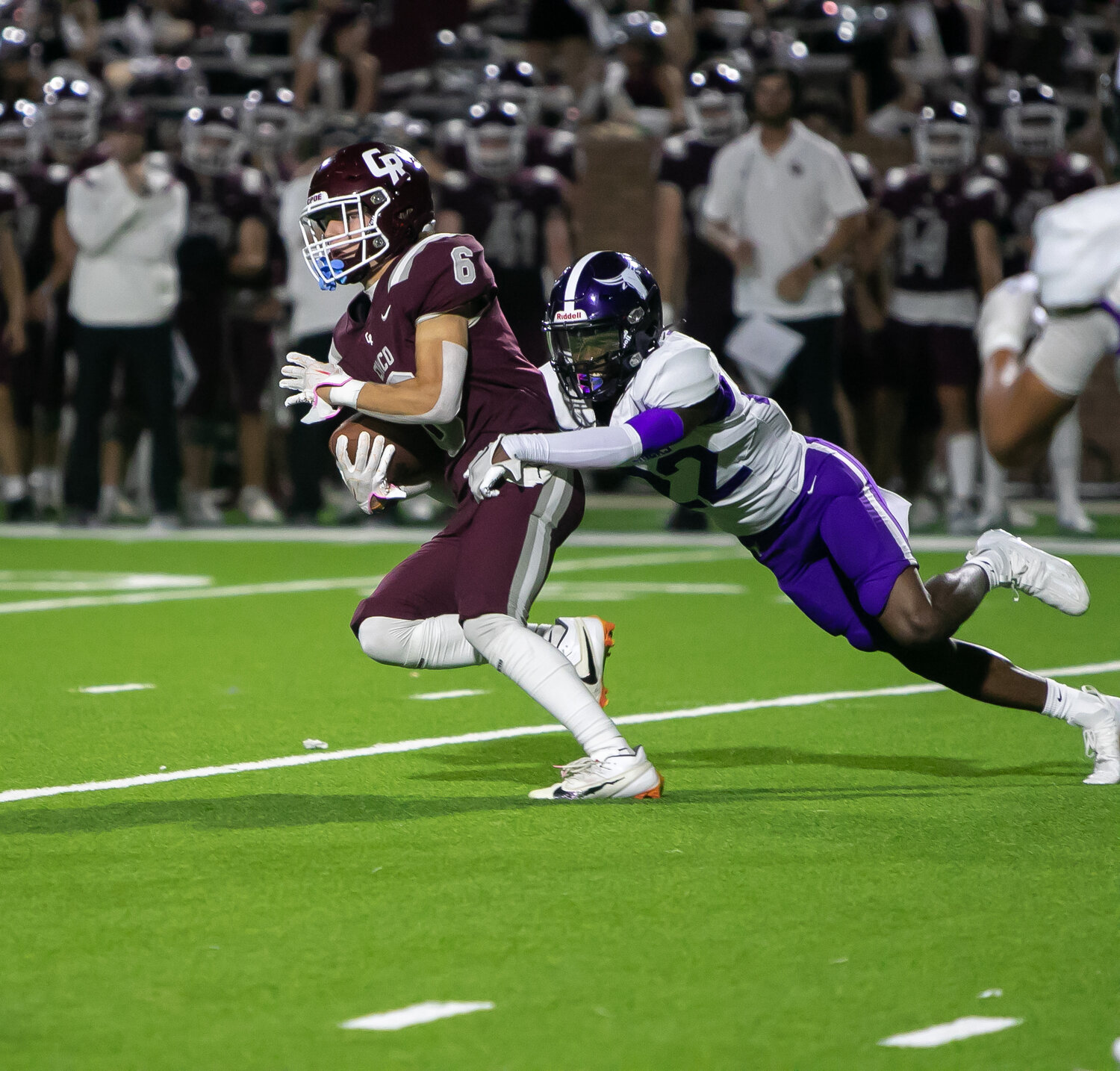 Scott Eckel turns upfield after catching a pass during Friday's District 19-6A game between Cinco Ranch and Morton Ranch on Friday at Rhodes Stadium.
