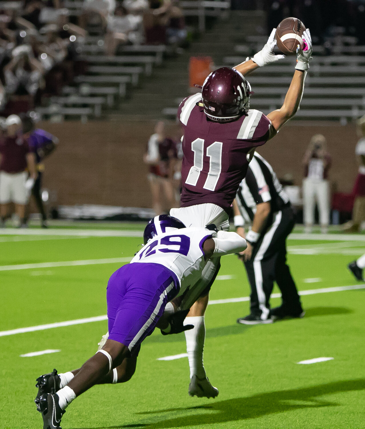Gavin Beavers catches a pass during Friday's District 19-6A game between Cinco Ranch and Morton Ranch on Friday at Rhodes Stadium.