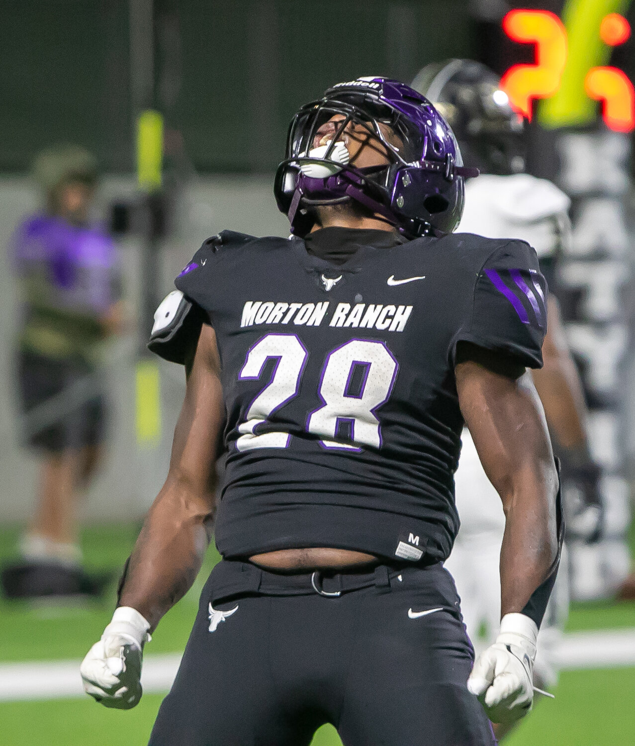 Ryan Hall celebrates after scoring a touchdown during Thursday's game between Jordan and Morton Ranch at Legacy Stadium.