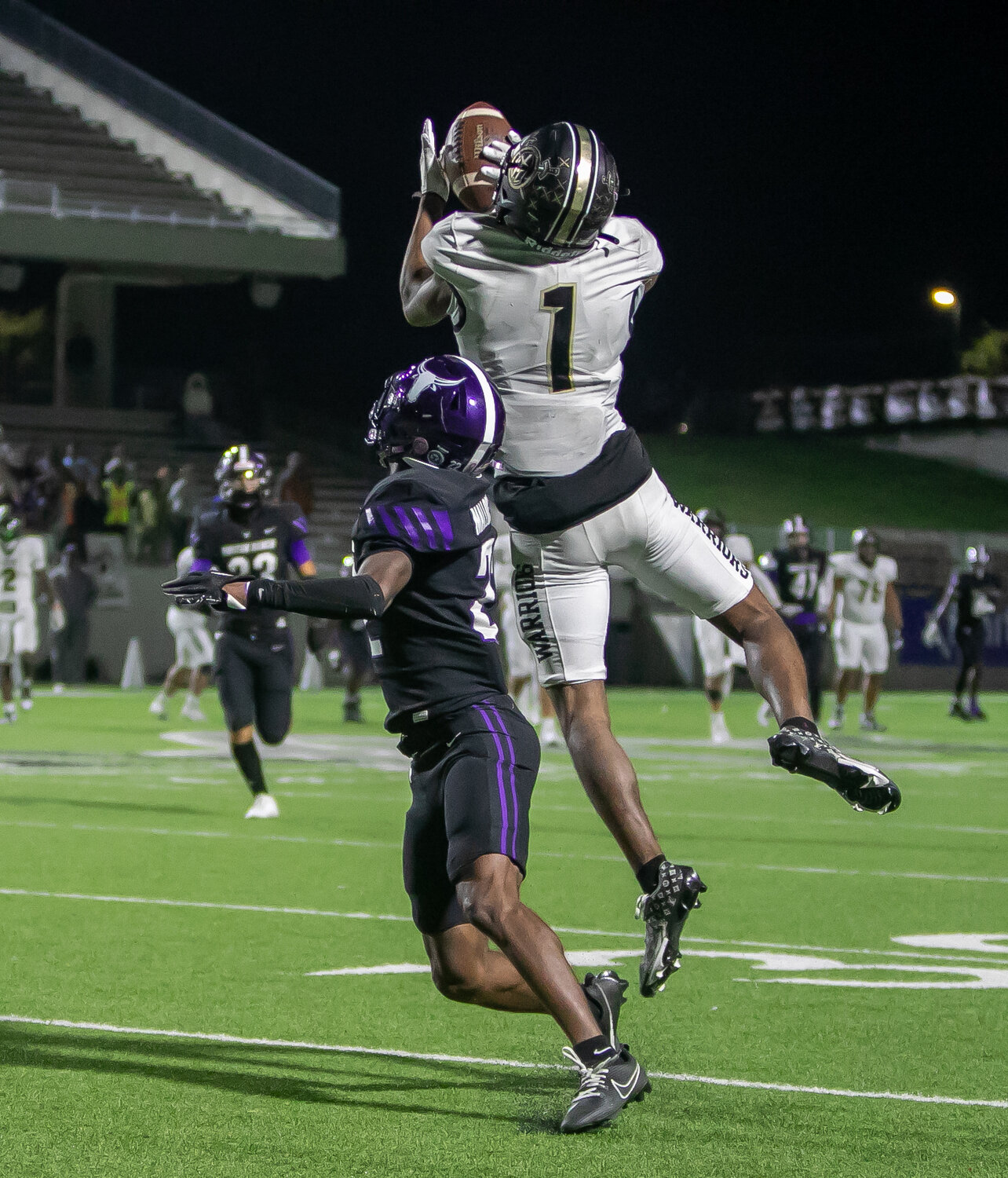 Zechariah Sample jumps to make a catch during Thursday's game between Jordan and Morton Ranch at Legacy Stadium.