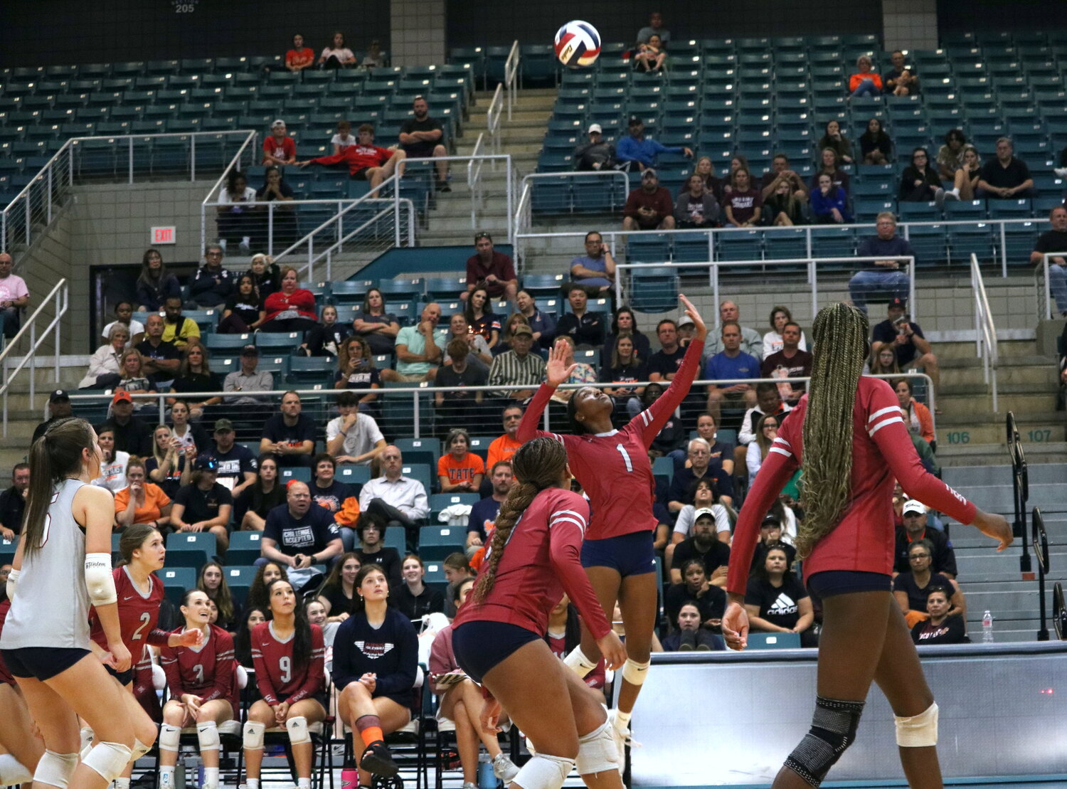 Tompkins’ Christian Cowart spikes the ball during Tuesday’s match between Seven Lakes and Tompkins at the Merrell Center.