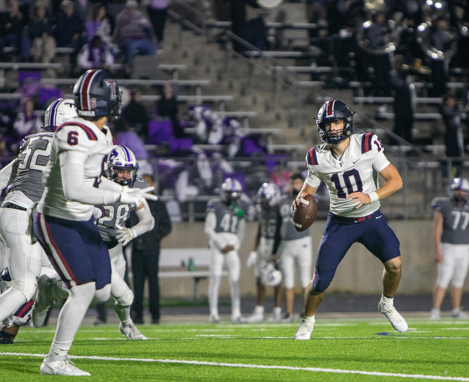 Wyatt Young looks to throw during Friday's game between Tompkins and Ridge Point at Hall Stadium.