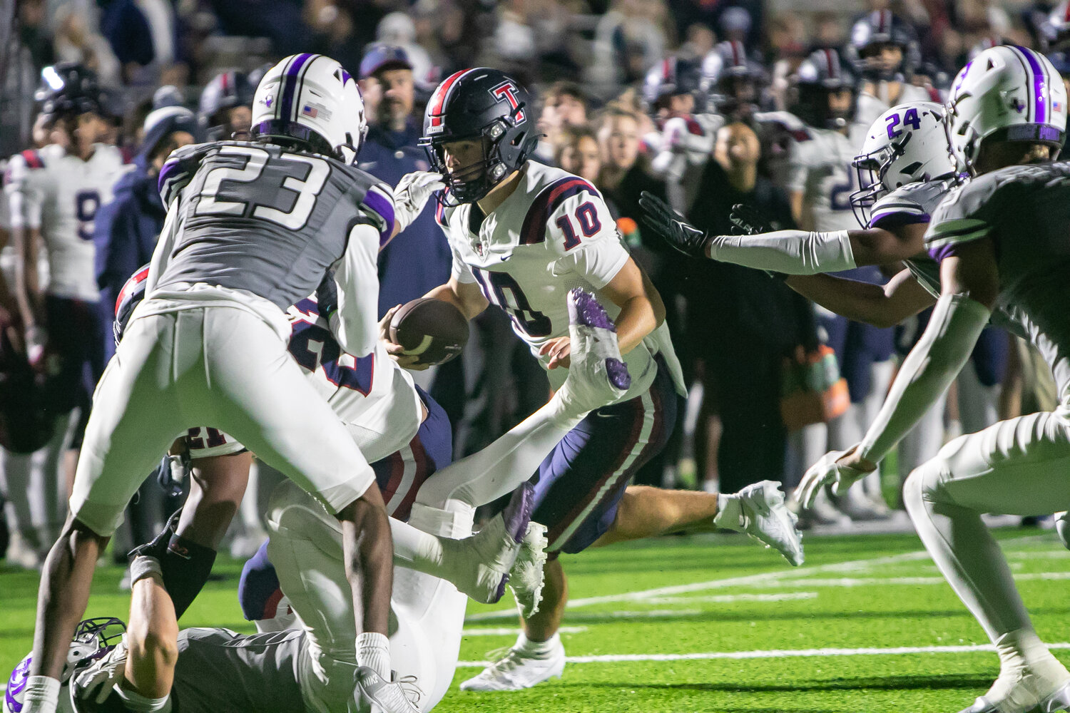 Wyatt Young tries to get past defenders during Friday's game between Tompkins and Ridge Point at Hall Stadium.