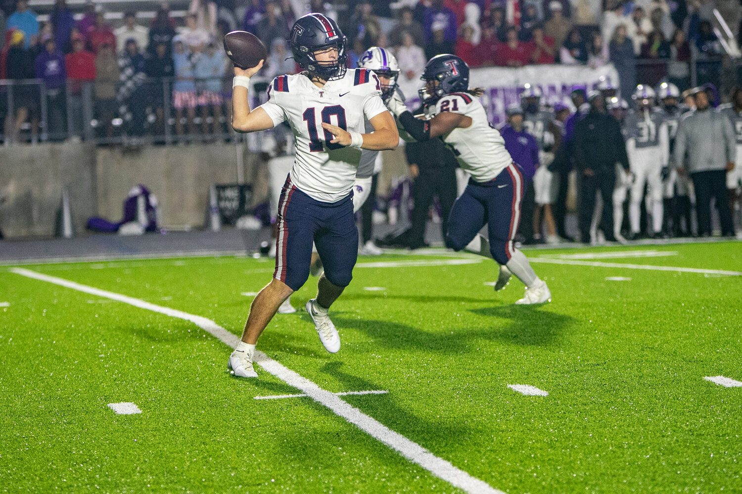 Wyatt Young passes during Friday's game between Tompkins and Ridge Point at Hall Stadium.
