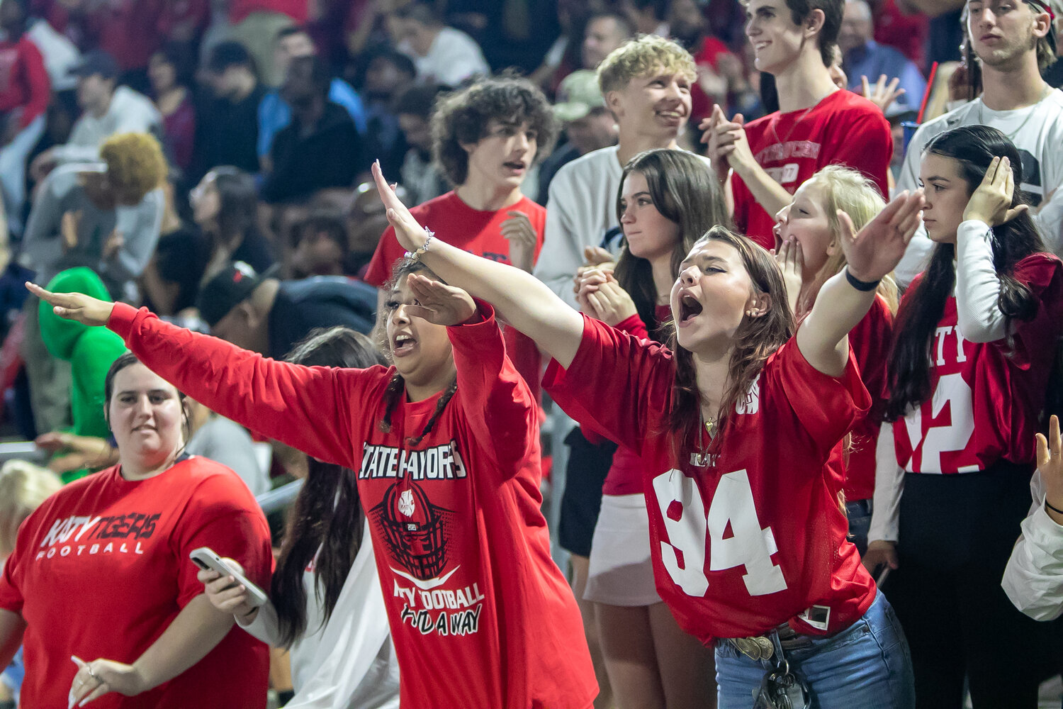 Katy fans cheer during Friday's area round game between Katy and Cy-Fair at the Berry Center in Cypress.