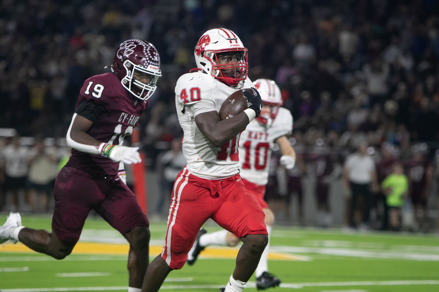 Tremayne Hill runs downfield during Friday's area round game between Katy and Cy-Fair at the Berry Center in Cypress.