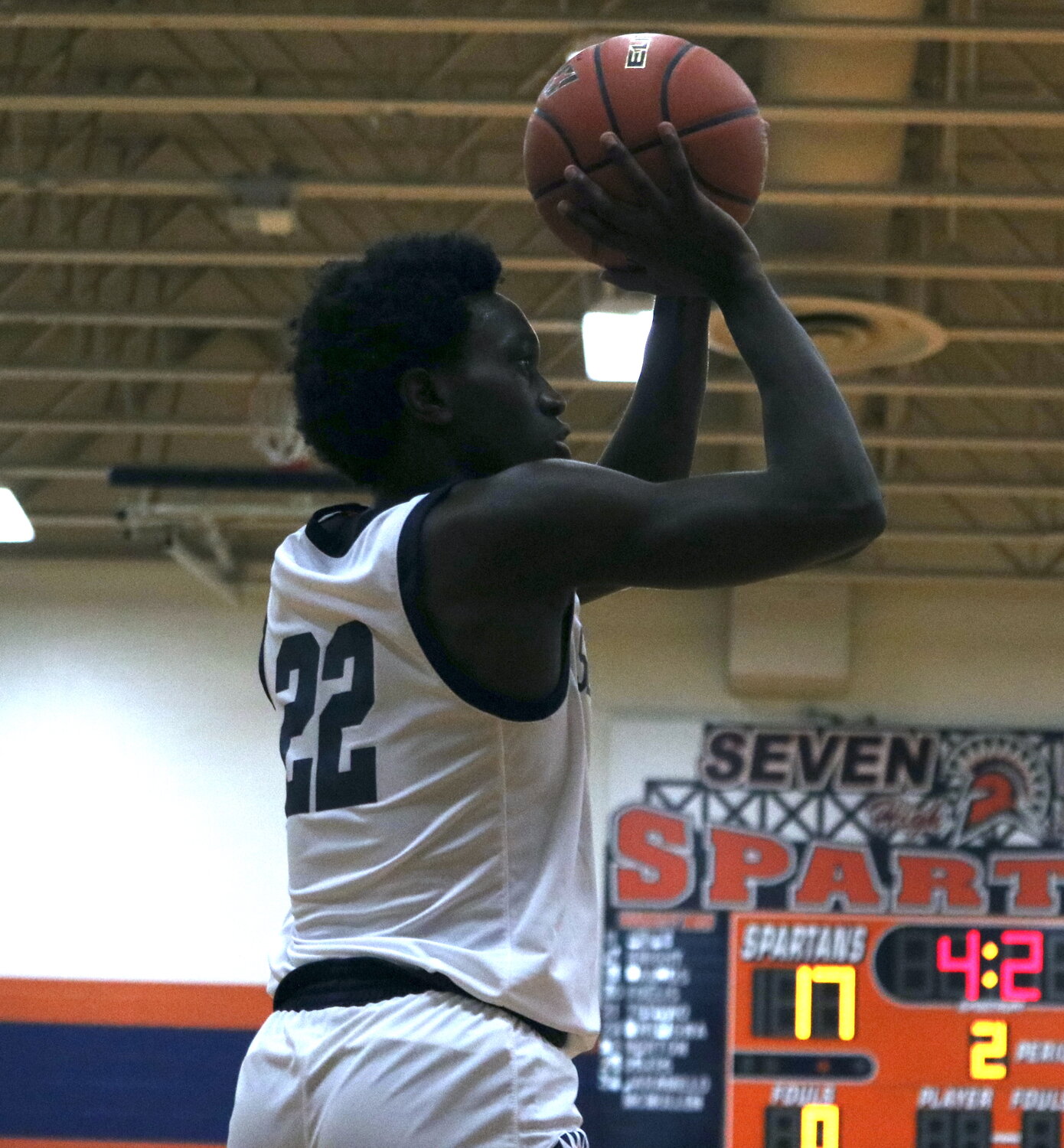 Sean Williams shoots the ball during Monday's game between Seven Lakes and Pearland Dawson at the Seven Lakes gym.