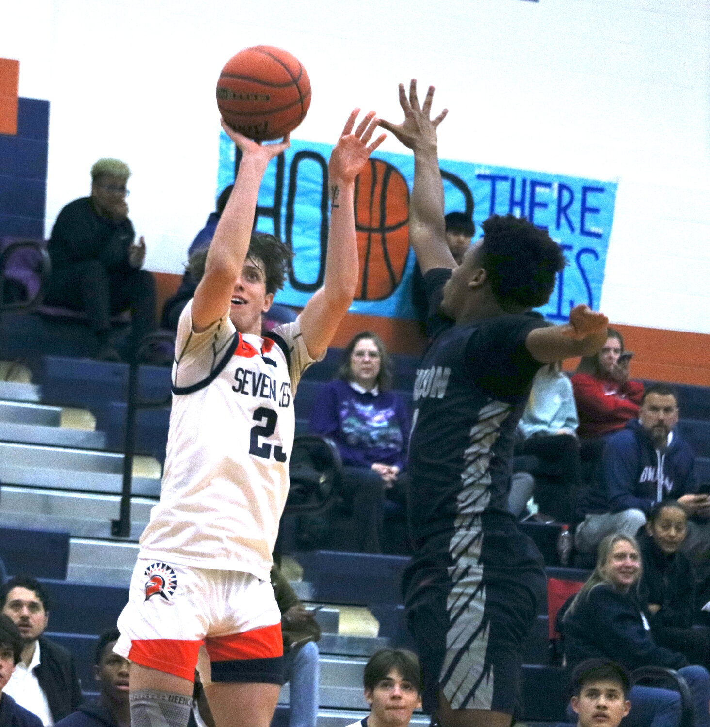 Brett Norton shoots the ball during Monday's game between Seven Lakes and Pearland Dawson at the Seven Lakes gym.