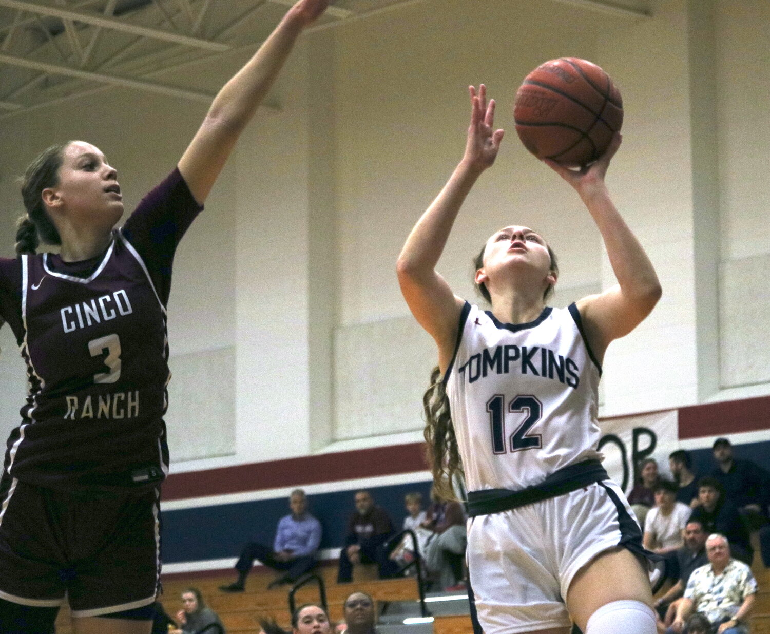 Haylie Panter shoots a layup during Tuesday's game between Tompkins and Cinco Ranch at the Tompkins gym.