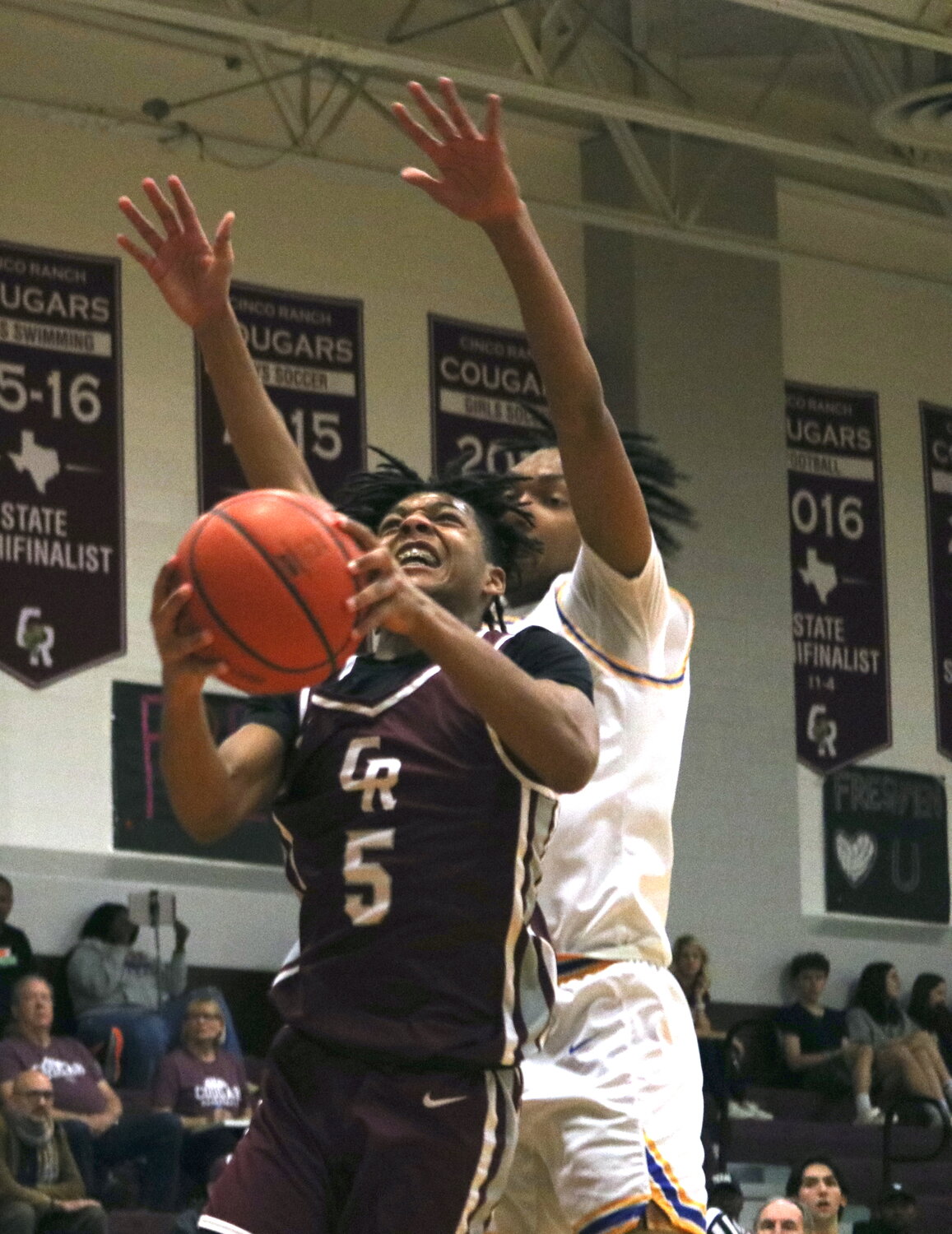 Dylan Jones-Bynum shoots a layup during Friday's game between Cinco Ranch and Klein at the Cinco Ranch gym.