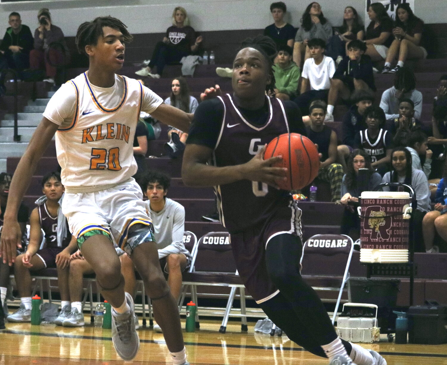 Prince Jones-Bynum drives to the basket during Friday's game between Cinco Ranch and Klein at the Cinco Ranch gym.