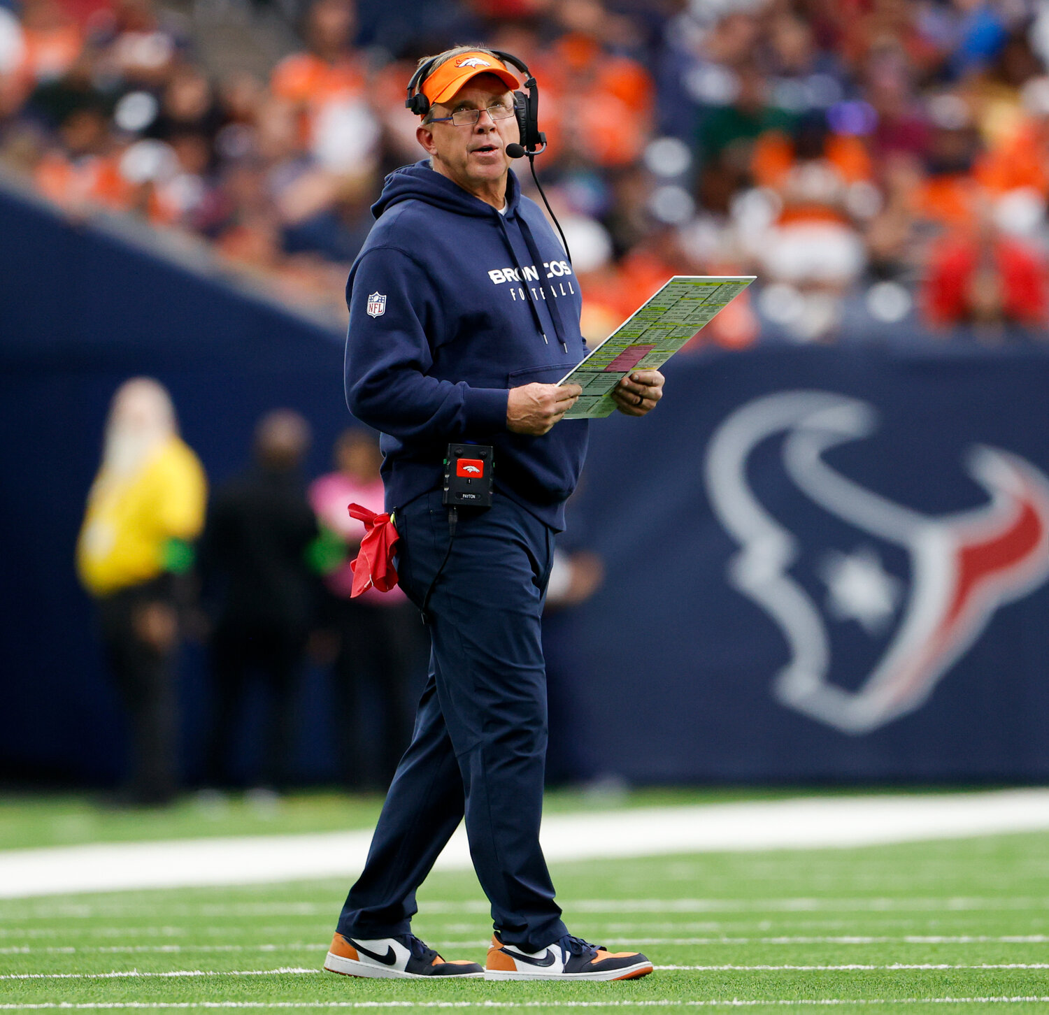 Broncos head coach Sean Payton looks up at the video board during a timeout in an NFL game between the Texans and the Broncos on December 3, 2023 in Houston. The Texans won, 22-17.