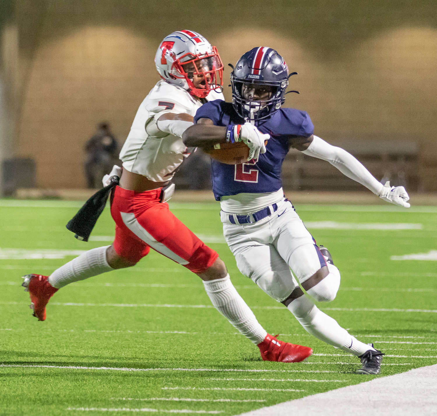 Tompkins senior running back Marquis Shoulders runs with the ball during the Falcons' 42-10 Class 6A Division I bi-district playoff win over Fort Bend Travis on Dec. 11 at Legacy Stadium.