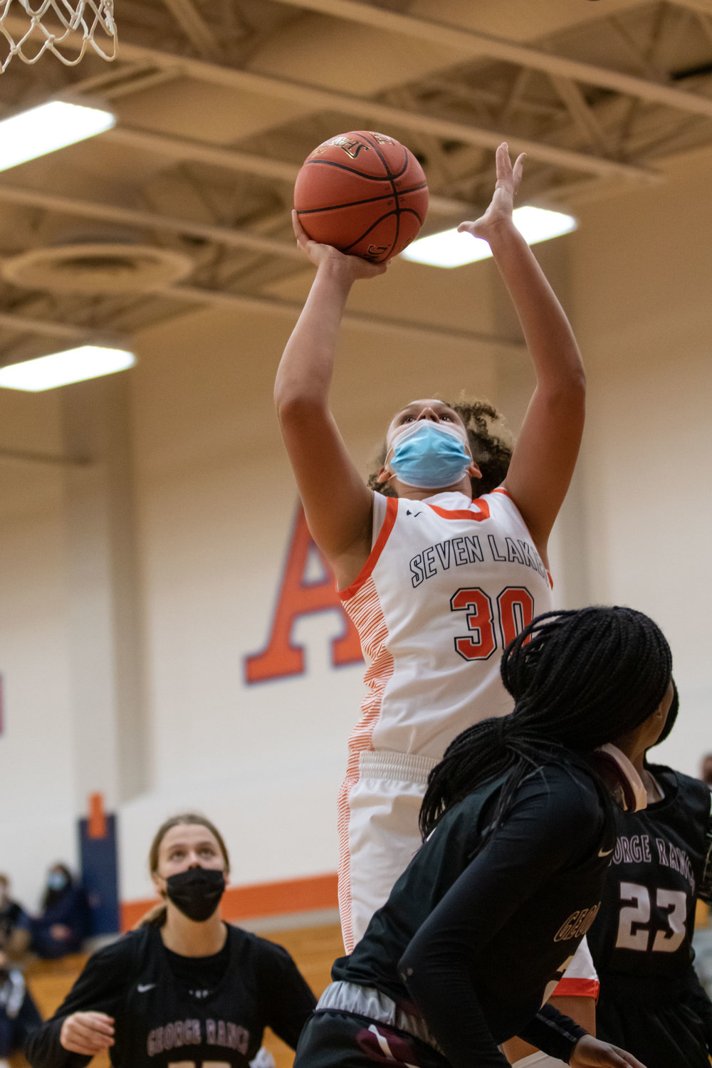 Seven Lakes freshman forward Justice Carlton goes up for a basket during a non-district game against George Ranch on Dec. 14 at Seven Lakes High.