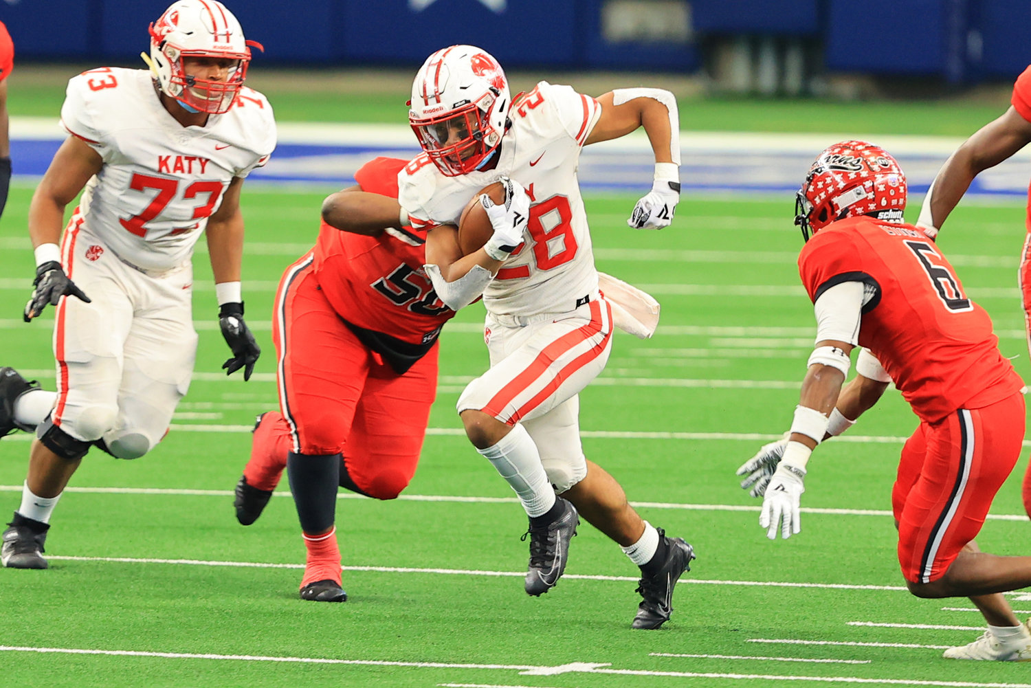 Katy senior running back Jalen Davis powers for yards during the Tigers' 51-14 win over Cedar Hill at AT&T Stadium on Saturday afternoon. Katy won the Class 6A-Division II state championship.