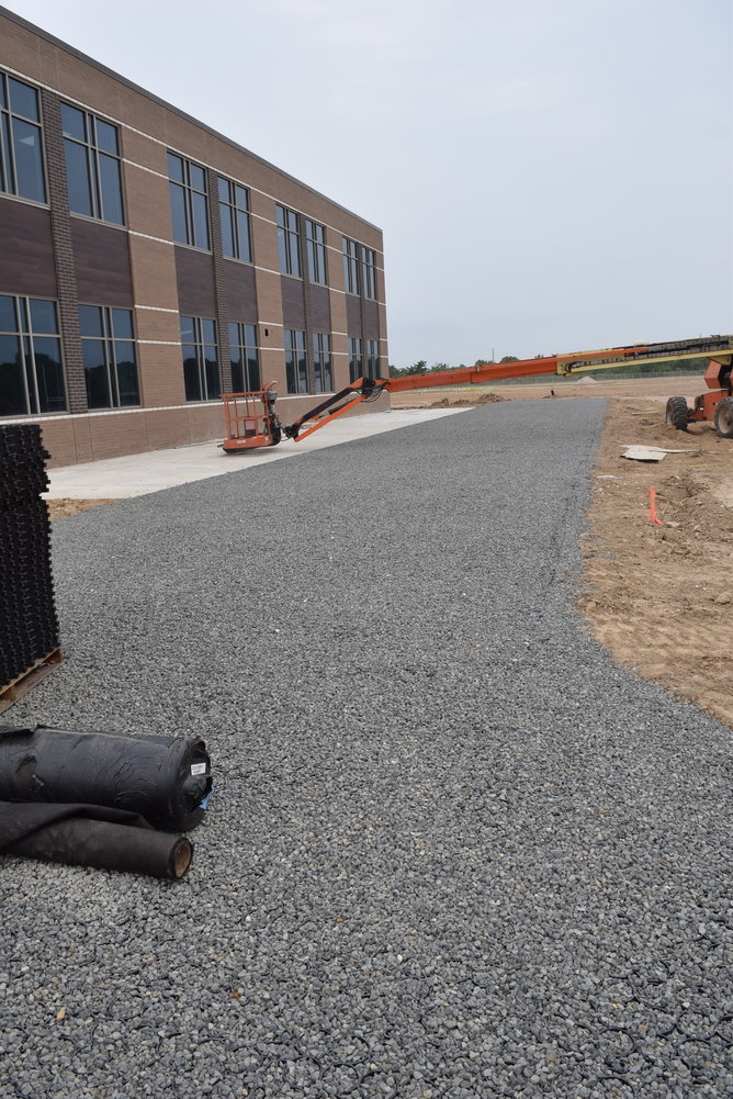 This rock driveway along Haskett's western side will allow emergency vehicles to access the building at need and is one of the emergency features integrated into the campus's design.
