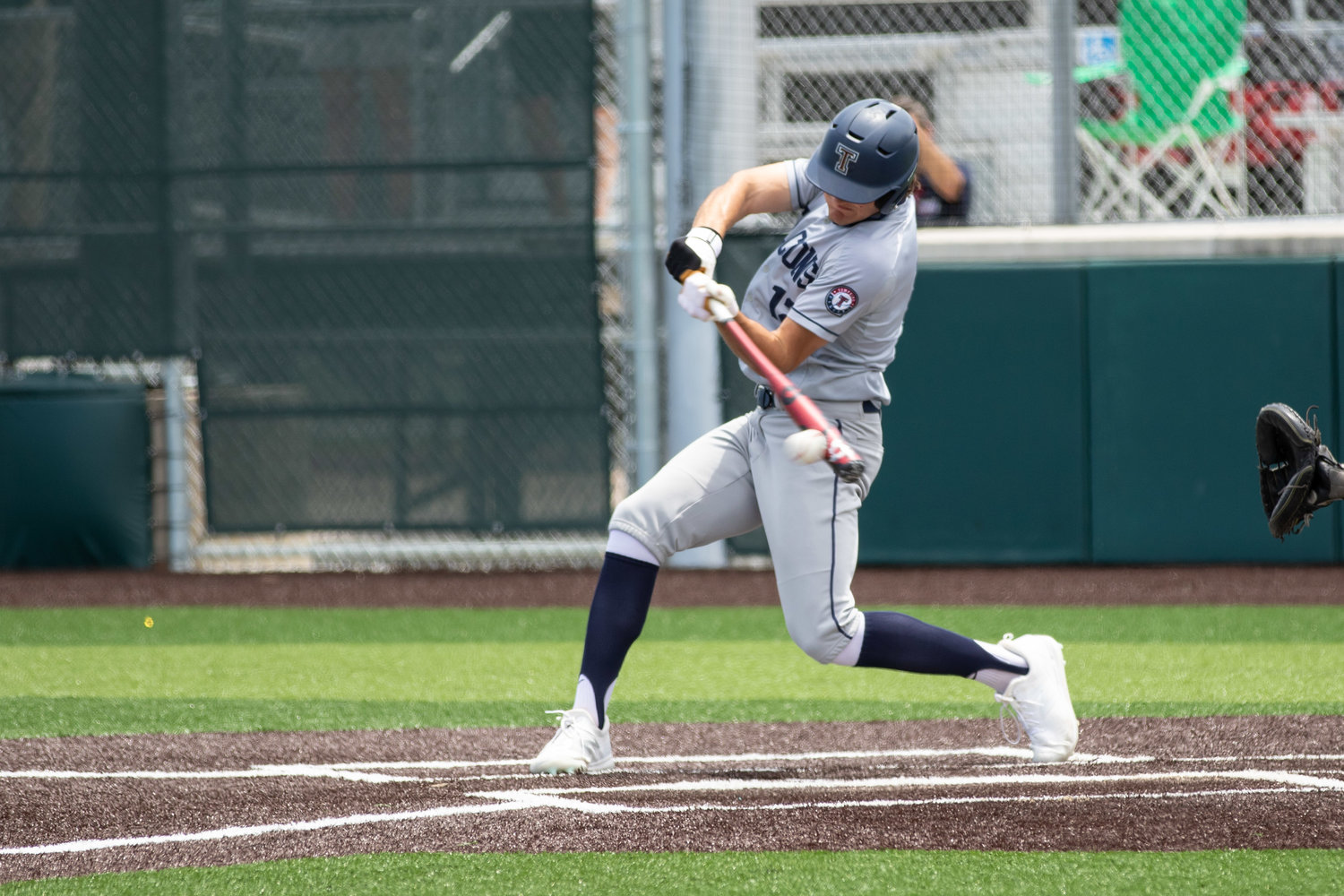 Tompkins junior Jace Laviolette takes a swing during Game 3 of the Falcons’ Region III-6A semifinals against Strake Jesuit on Saturday, May 29, at Cy-Falls High.