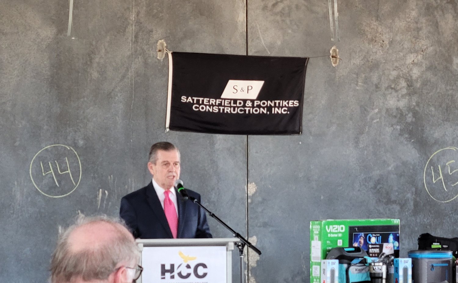 HCC Norwestern College President Zachary Hodges speaks at the new HCC Katy campus's topping out ceremony. Hodges said the new campus will help the Katy area develop a workforce that will help bolster the local economy.