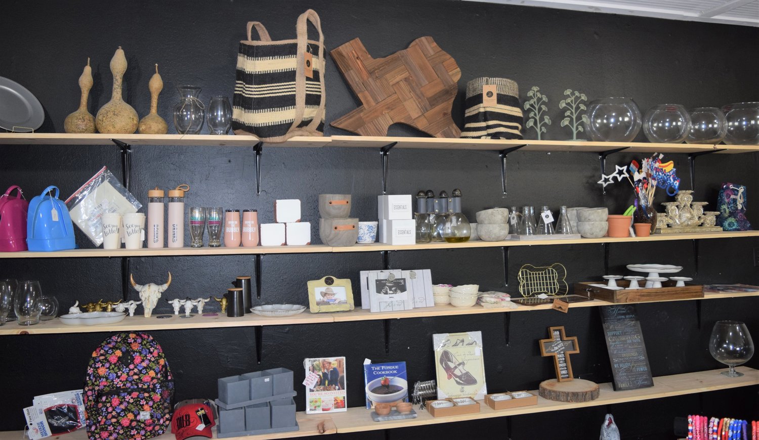 Bloomin’ 90’s inventory includes a wide variety of options. Handcrafted items such as gourd art and Texas-shaped cutting boards sit alongside craft supplies and cookware on the gift shop’s shelves.