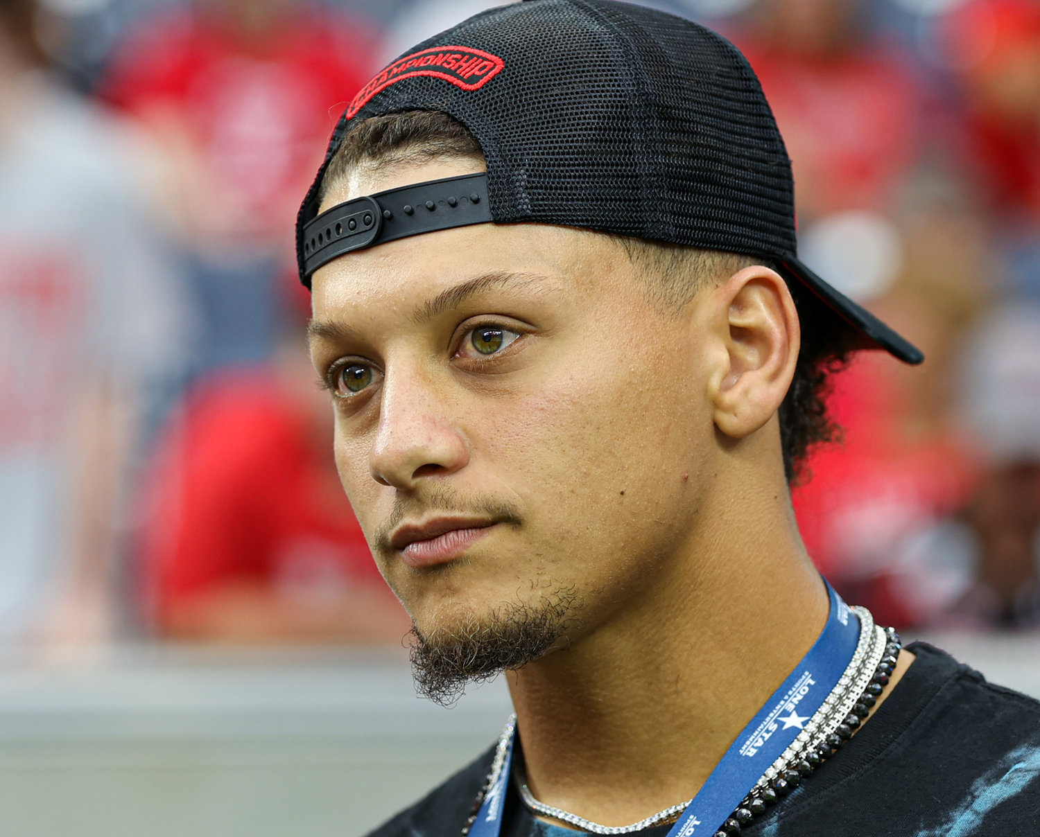 Kansas City Chiefs quarterback Patrick Mahomes on the sidelines before an NCAA football game between Houston and Texas Tech on September 4, 2021 in Houston, Texas.