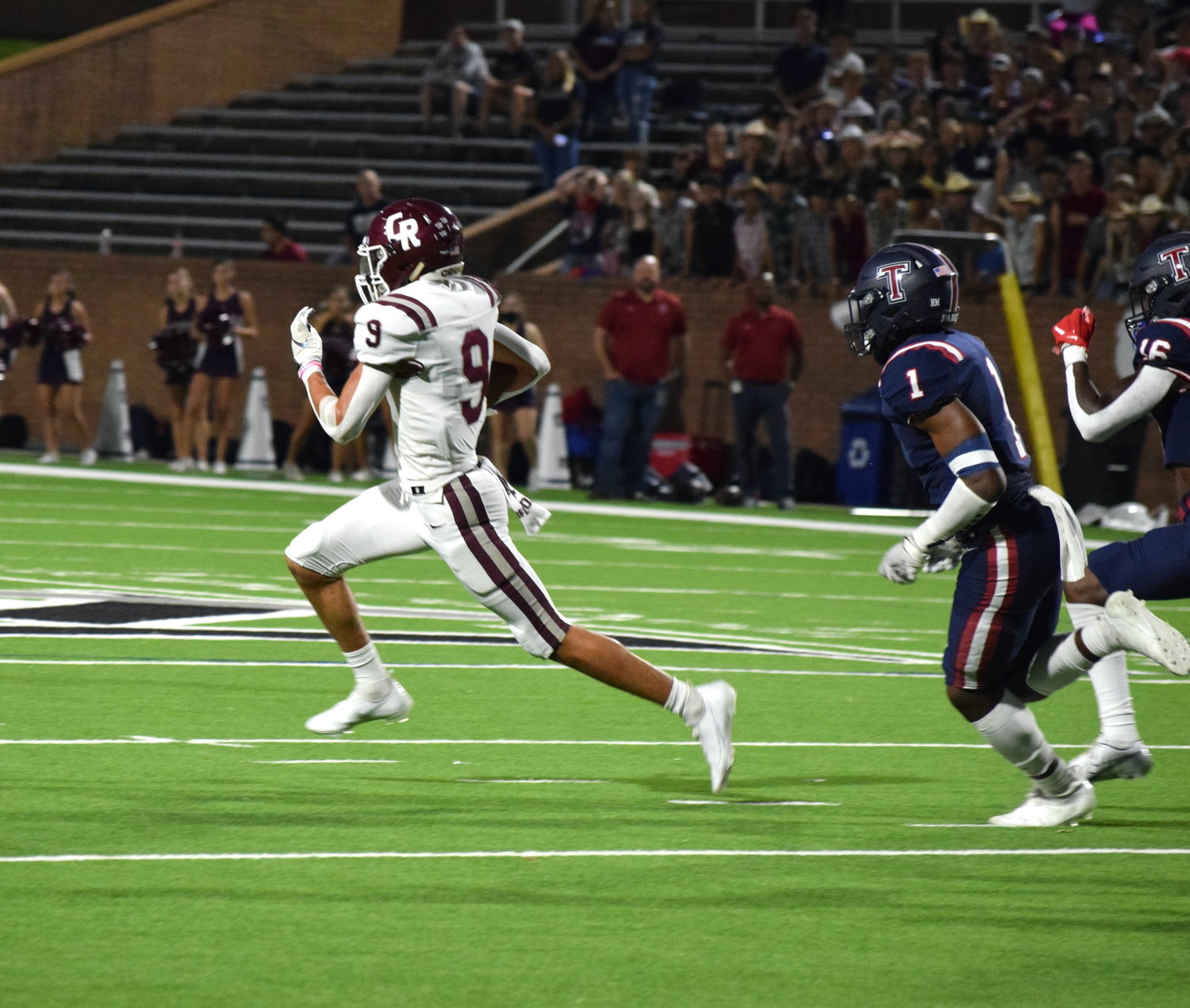 Cinco Ranch’s Yextiel Perez-Gilbes returns a kickoff for a touchdown against Tompkins at Rhodes Stadium on Thursday.