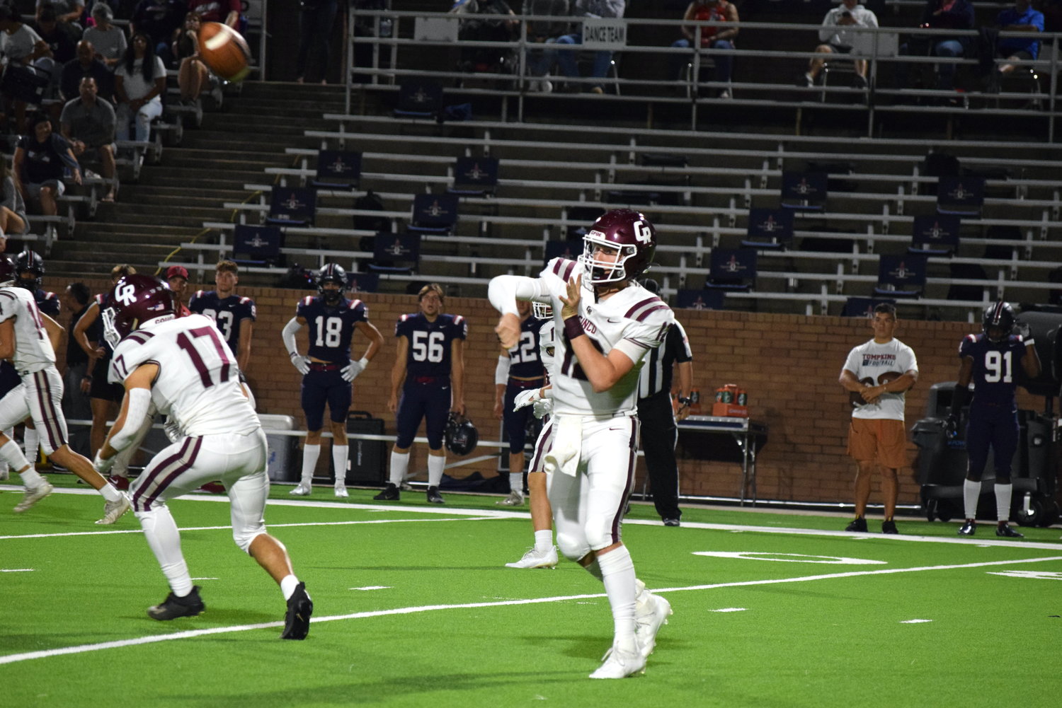 Cinco Ranch’s Gavin Rutherford throws a pass during a game against Tompkins at Rhodes Stadium on Thursday.