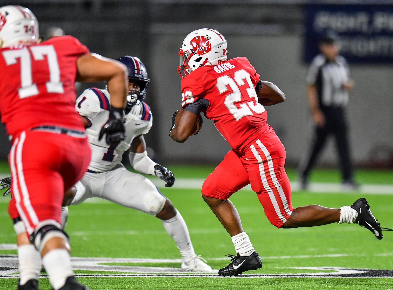 Katy, Tx. Oct. 1, 2021: Katy's #23 Seth Davis takes it up the middle for a TD during a conference game between Katy Tigers and Tompkins Falcons at Legacy Stadium in Katy. (Photo by Mark Goodman / Katy Times)