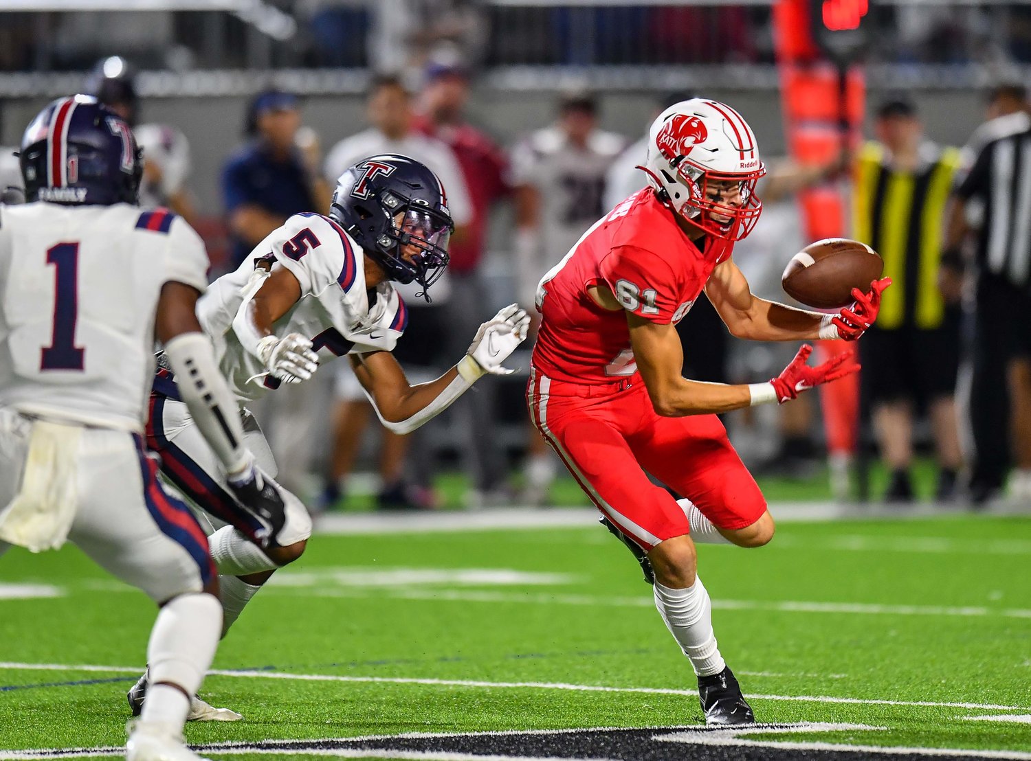 Katy, Tx. Oct 1, 2021:  Katy's #81 Jr Ceyanes makes the reception during a conference game between Katy Tigers and Tompkins Falcons at Legacy Stadium. (Photo by Mark Goodman / Katy Times)