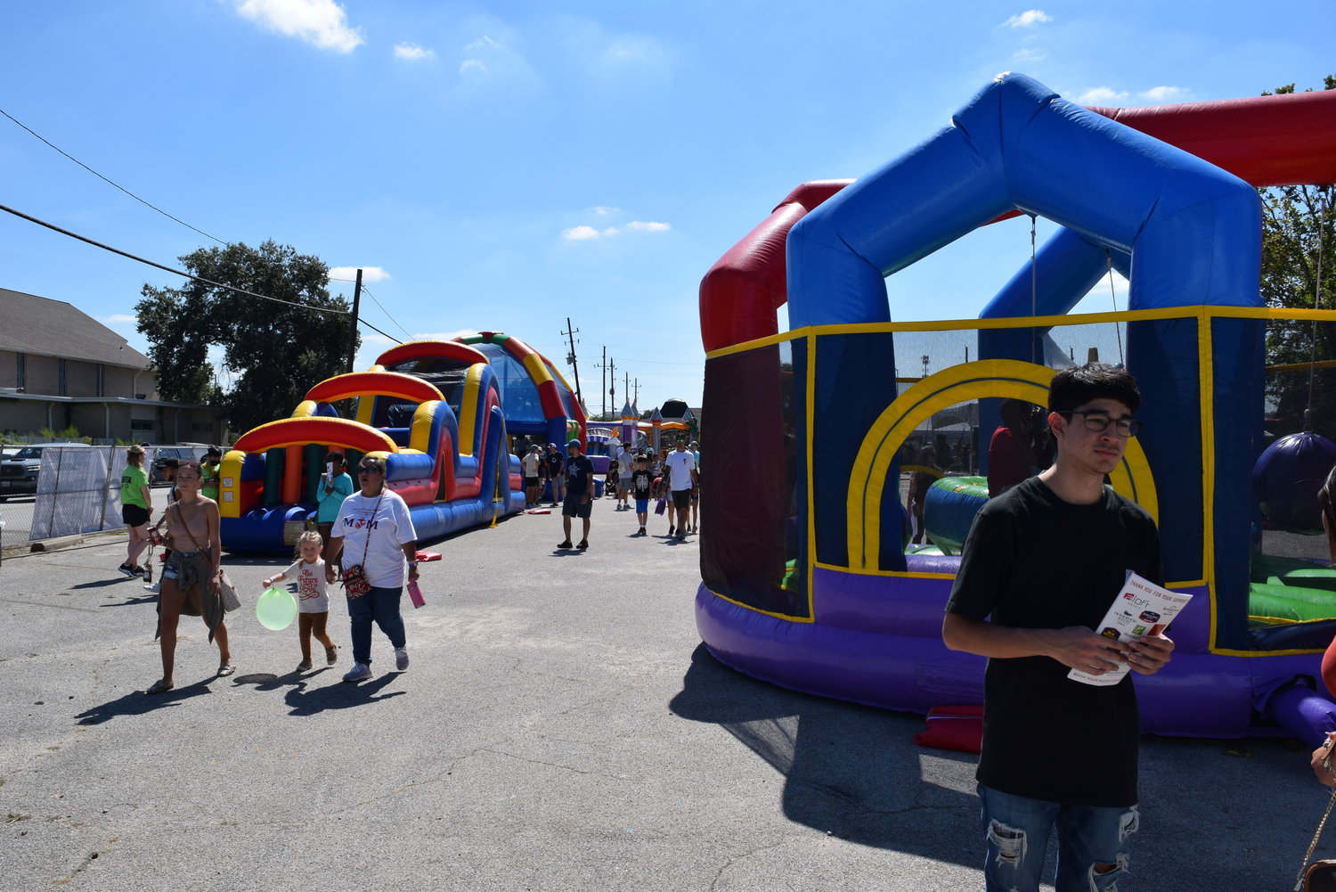 The children and teens area of the festival, just east of KT Antiques included several bounce houses, a live DJ and a child-friendly booth. Throughout the festival, children could be seen playing and having a fun time with their families, including a few babies napping in strollers.