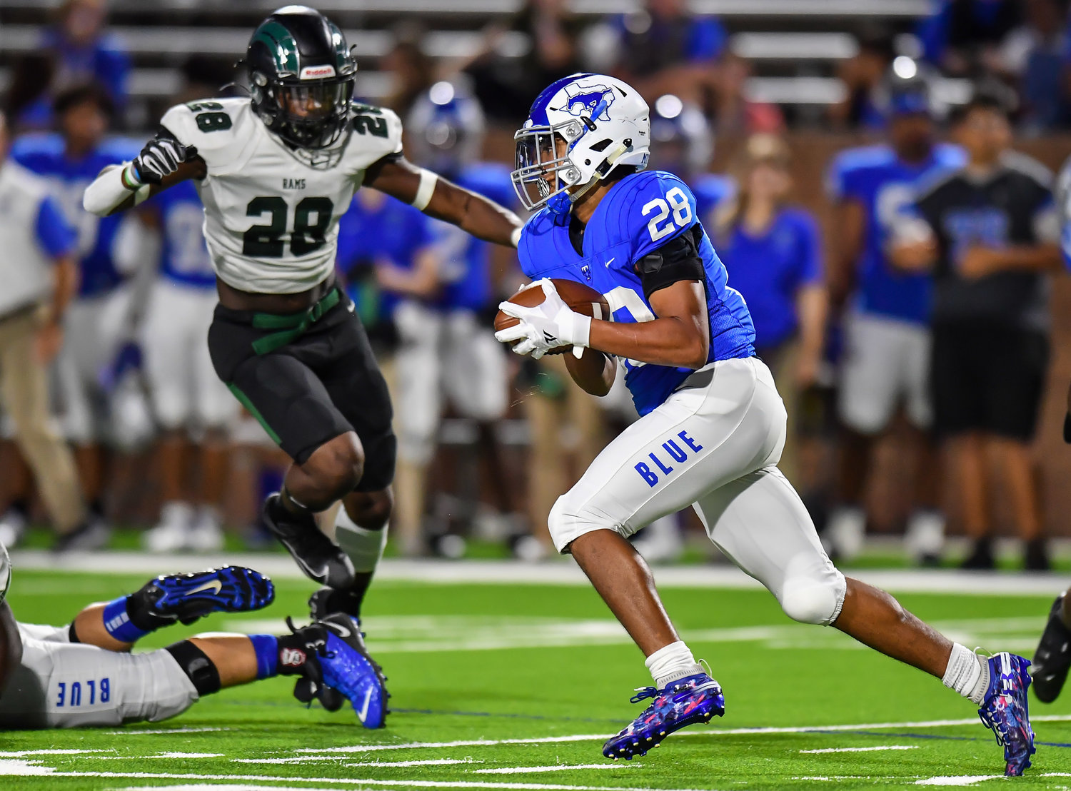 Katy, Tx. Oct 15, 2021: Katy Taylors Tyler Irving #28 carries the ball during a conference game between Mayde Creek and Katy Taylor at Rhodes Stadium. (Photo by Mark Goodman / Katy Times)