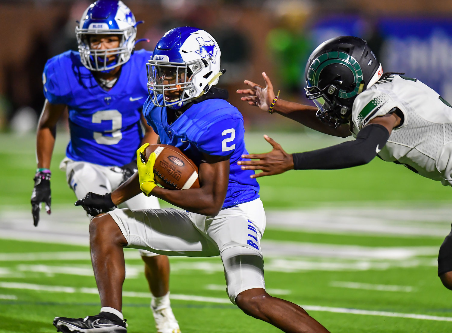 Katy, Tx. Oct 15, 2021:  Katy Taylors Michael Whitaker iii #2 rushes up the middle avoiding a tackle during a conference game between Mayde Creek and Katy Taylor at Rhodes Stadium. (Photo by Mark Goodman / Katy Times)
